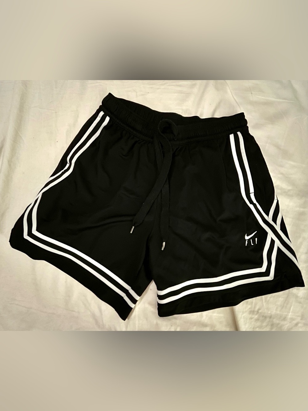 Nike Black Athletic Shorts with White Stripe Trim